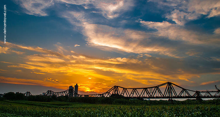 Take in the views from Long Bien Bridge