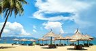 Photo of a sandy beach with blue sky and sea in Nha Trang, Vietnam