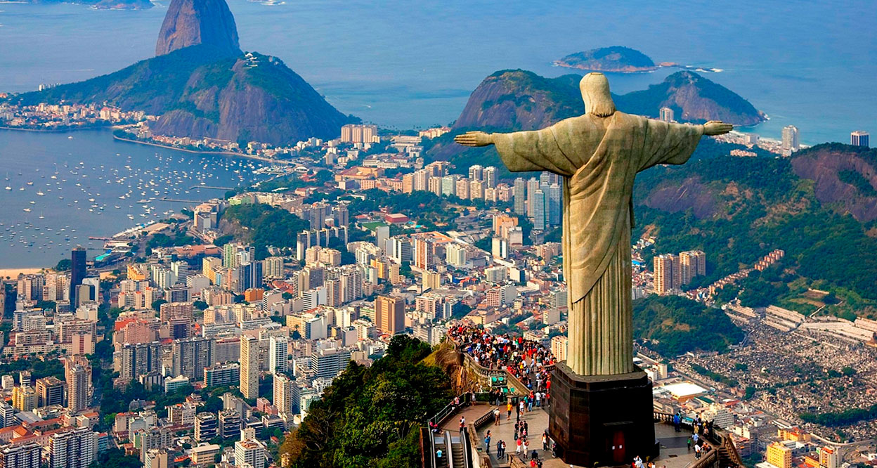 The image of the Christ the Redeemer statue overlooking the sea in Rio De Janeiro