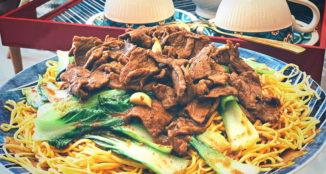 My Xao Bo (fried beef noodles) is a common dish in Vietnam which is sold in restaurants or food stalls