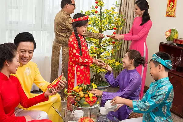 Traditional “Li Xi” Custom - Giving Luckey Money on Tet in Vietnam