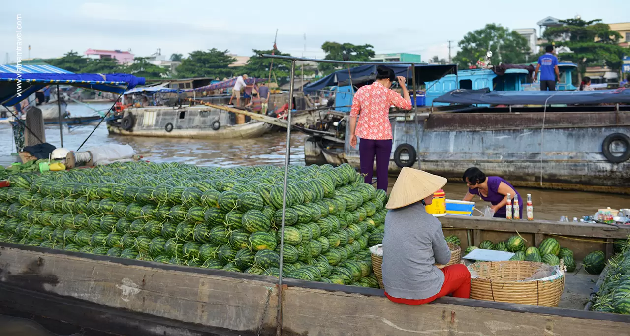 Selling watermelon in Cai Rang floating market