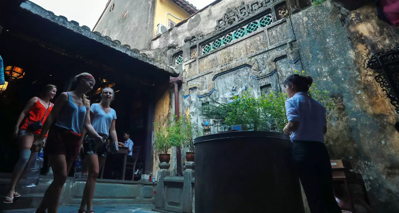 Foreign tourists visiting Tan Ky Old House