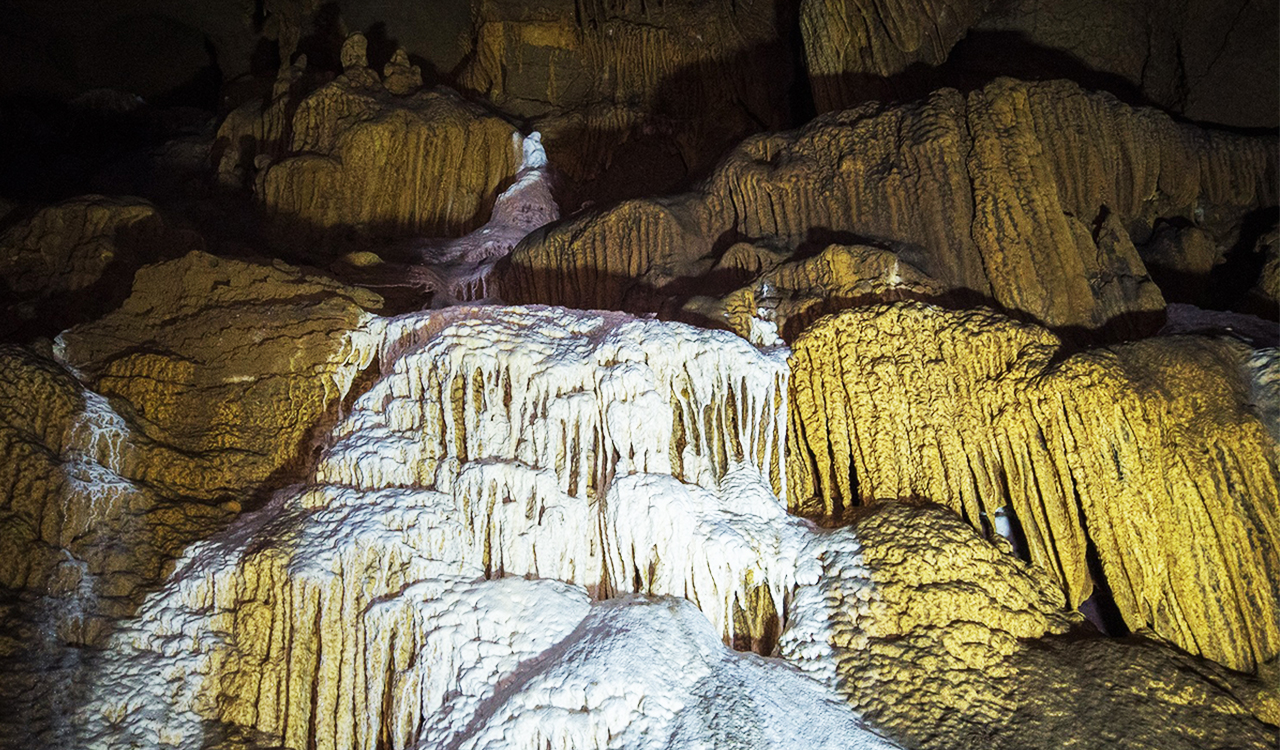 Stalactite in many colors of Na La cave