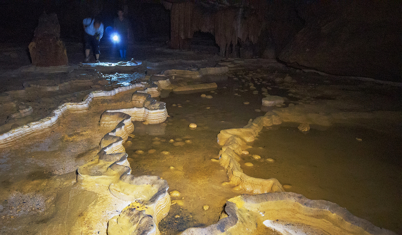 On the floor, the stalagmite shaped as terrace field