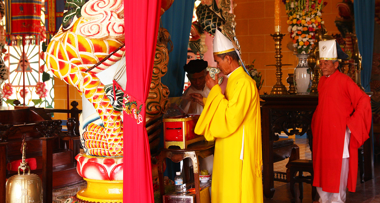 a ceremony of Cao Dai temple