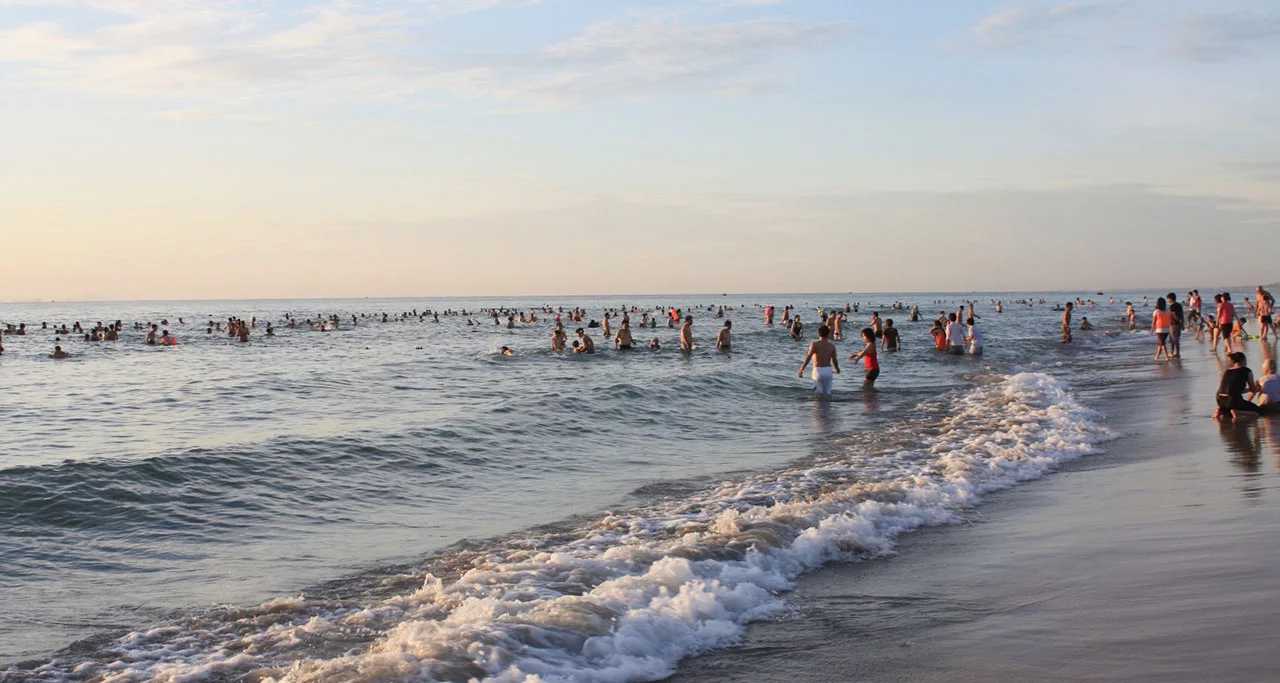 Danang beaches is crowded with a lot of local tourists in summer time