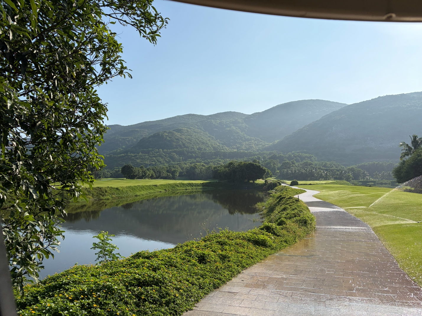 Lake and cart path beside the fairway on Hon Tre Island
