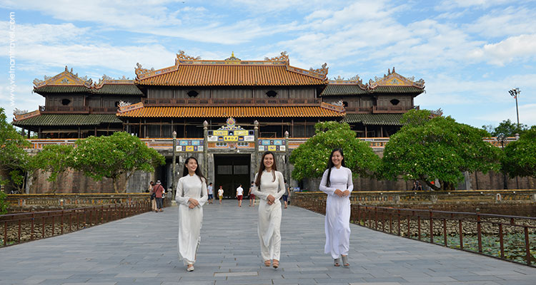 Beautiful Vietnamese girls in Ao Dai ( long dress) at Hue Citadel